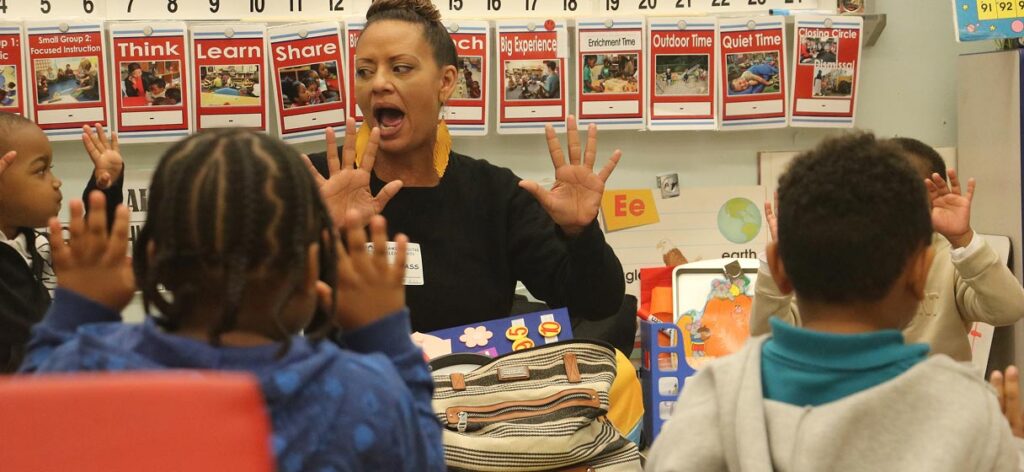 Happy teacher with students